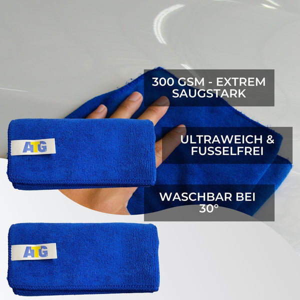 Ein blaues Handtuch der ATG GmbH & Co. KG mit blauem AG-Logo, perfekt zum Polieren von Scheinwerfern und Entfernen von Kratzern.